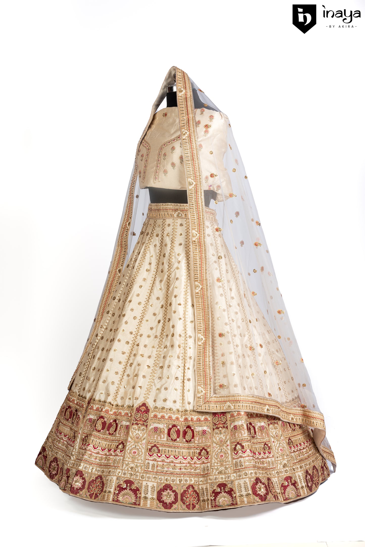 Golden Elegance: Semi-Stitched Ivory Raw Silk Lehenga with Bejeweled Accents