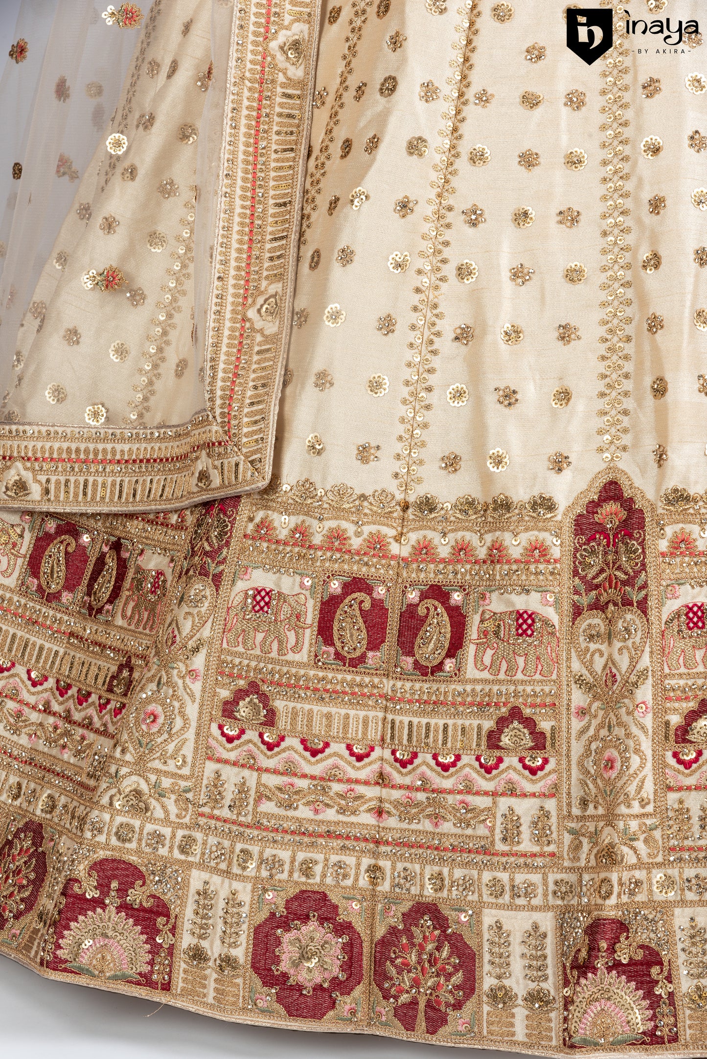 Golden Elegance: Semi-Stitched Ivory Raw Silk Lehenga with Bejeweled Accents