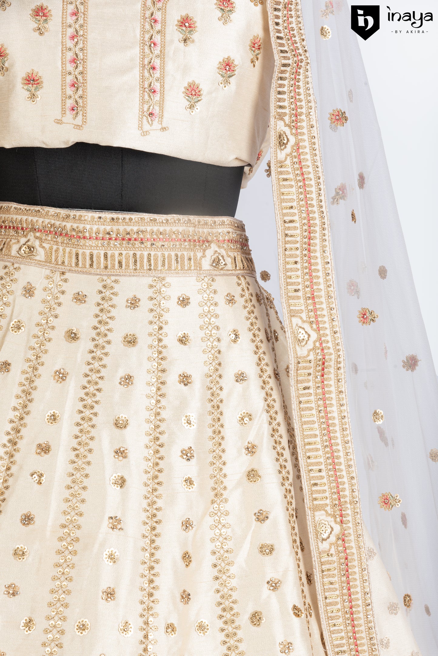 Golden Elegance: Semi-Stitched Ivory Raw Silk Lehenga with Bejeweled Accents