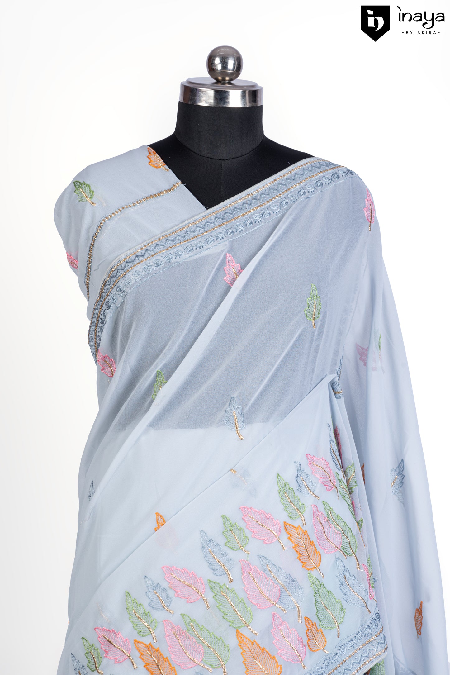 Serene Sky Blue Georgette Saree with Pastel Leaf Motifs