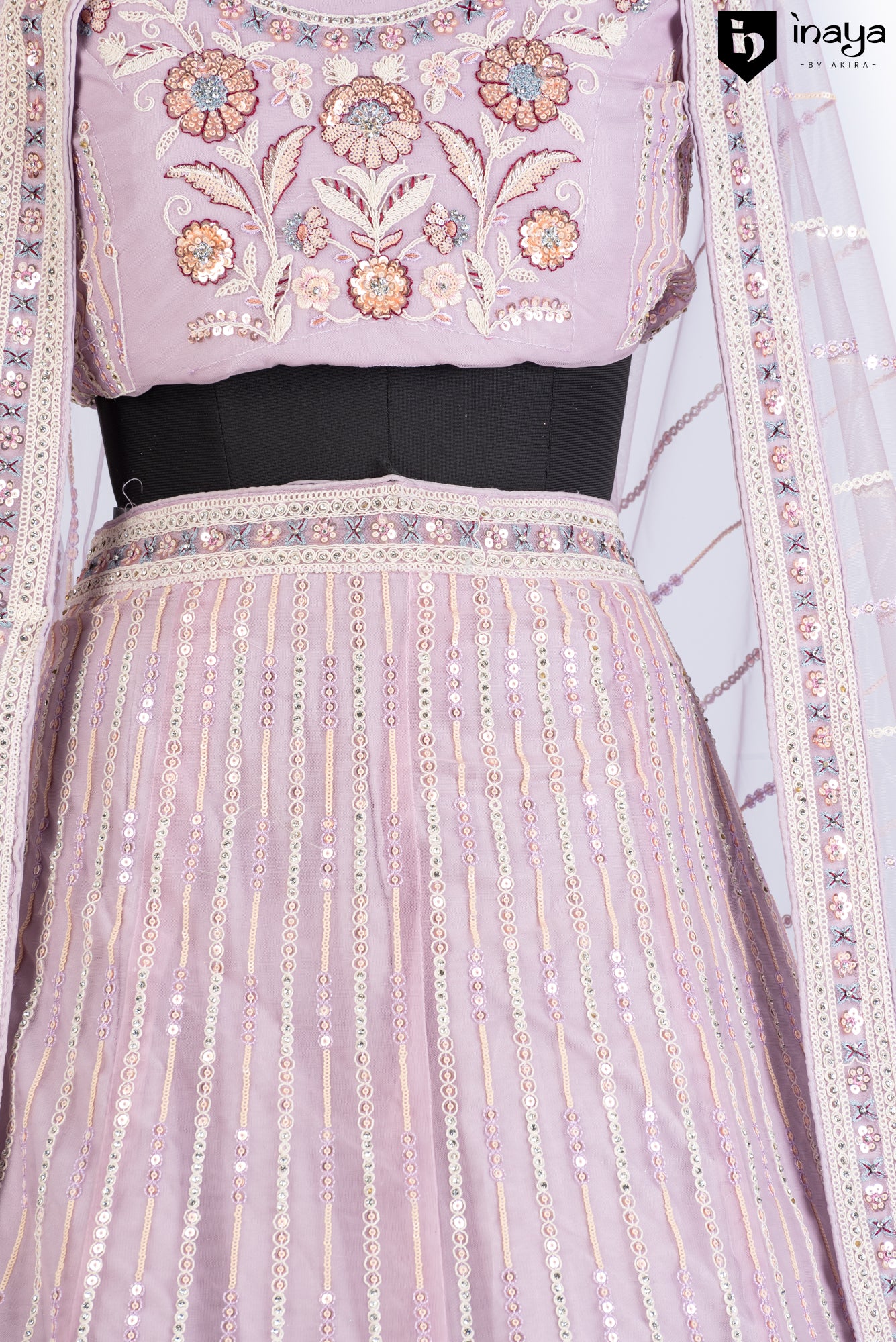 Lavender Hues: An Exquisite Net Lehenga with Elegant Embroidery