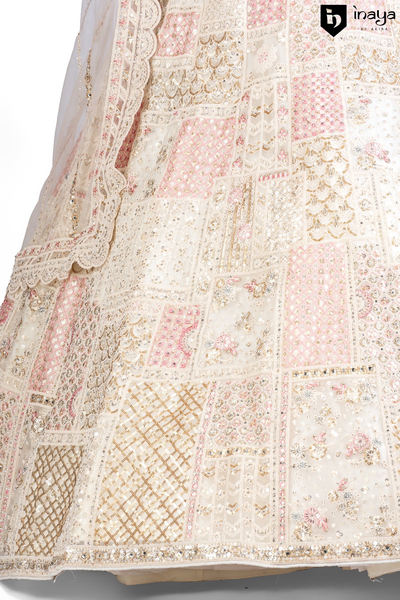 Vintage Cream Elegance: Cream Netted Fabric Semi-Stitched Lehenga with Delicate Embroidery