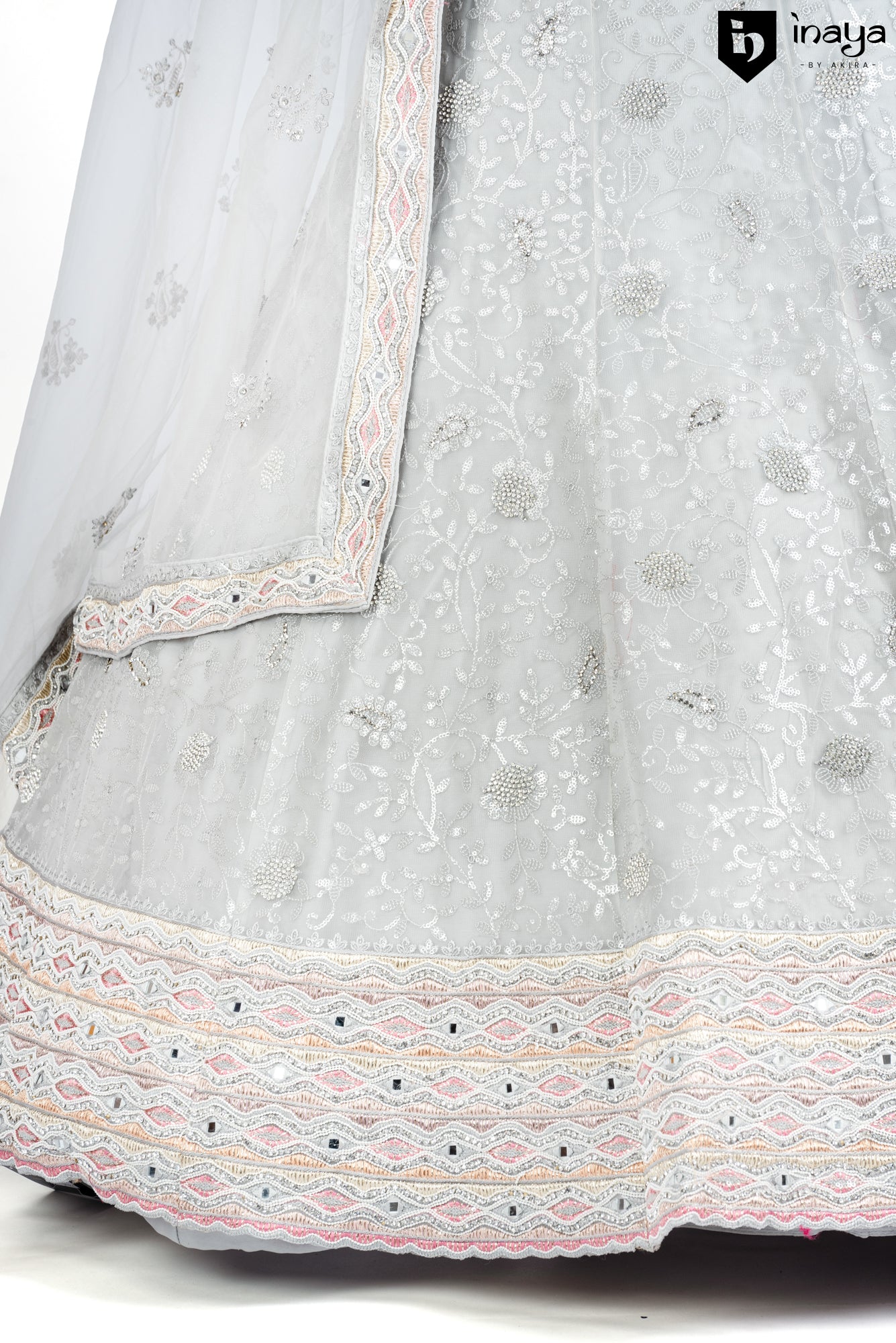 Moonlit Gleam: Silver Net Semi-Stitched Lehenga with Delicate Embroidery