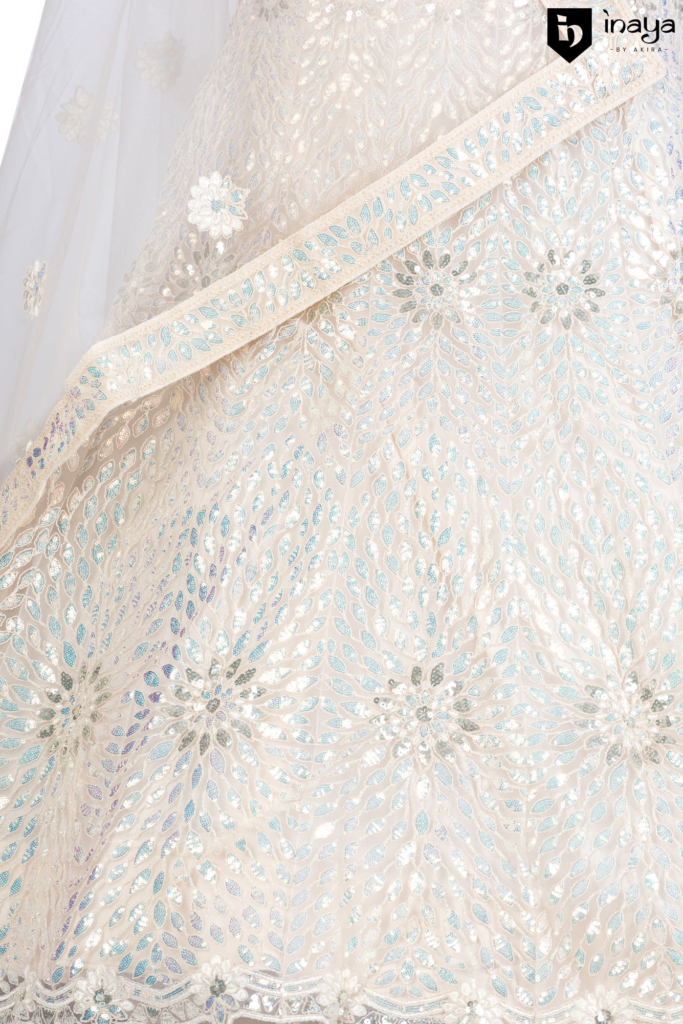 Iridescent Ivory: Ivory Net Semi-Stitched Lehenga with Crystal Embellishments