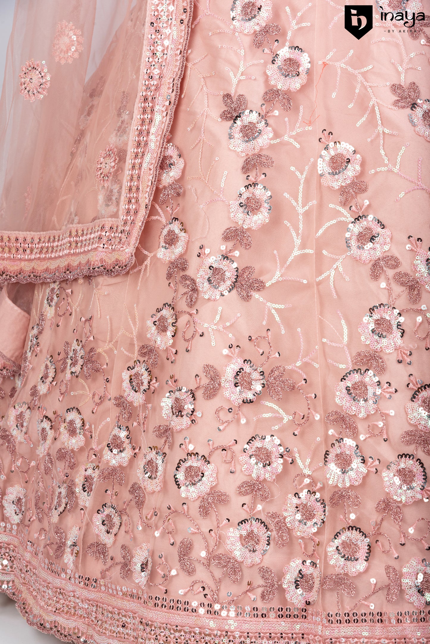 Peach Perfection: Peach Netted Fabric Semi-Stitched Lehenga with Sequin Flourishes