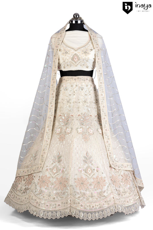 Ethereal Glow: Ivory Net Semi-Stitched Lehenga with Sequin Embroidery