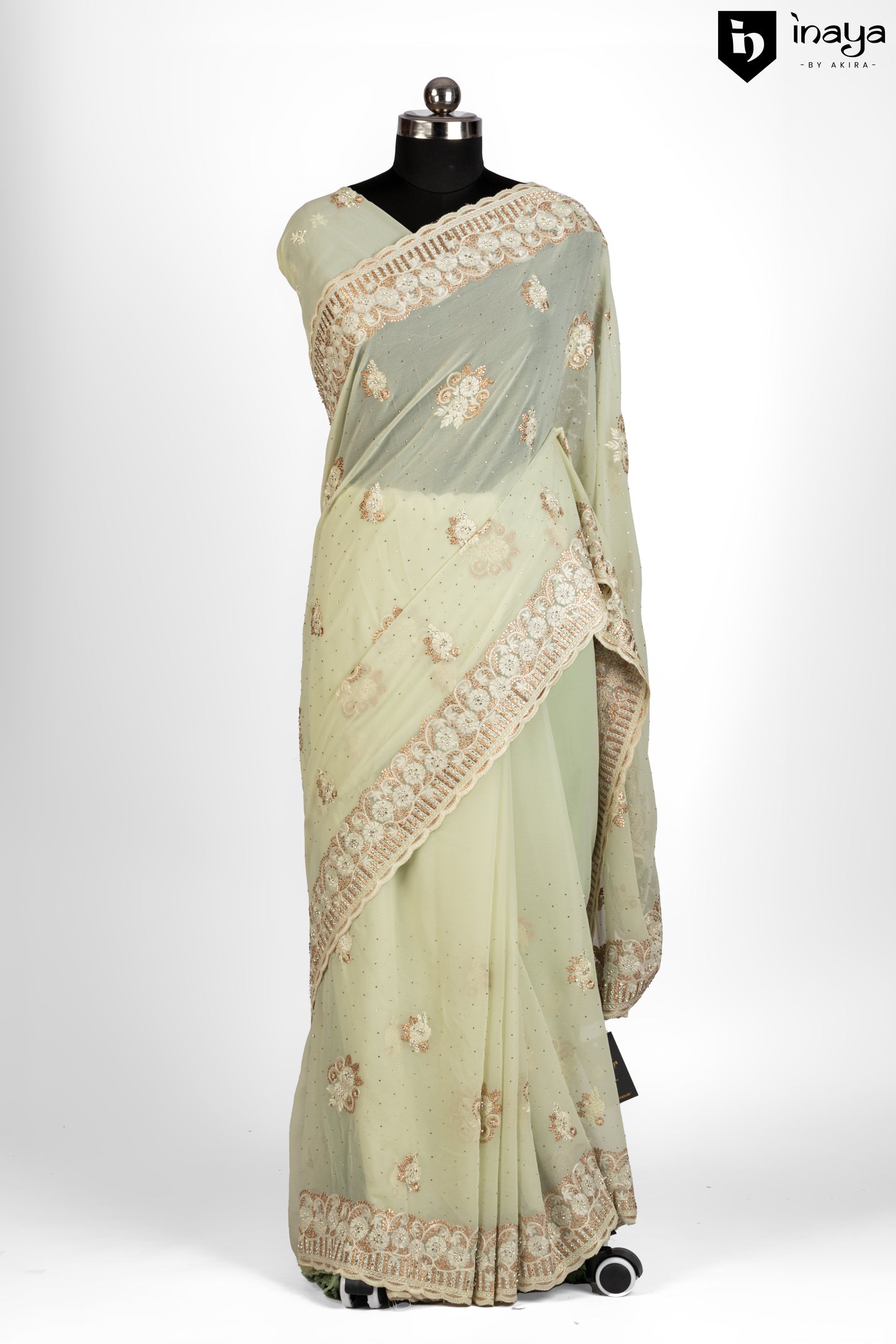 Pista Green Georgette Saree with Golden Embellishments