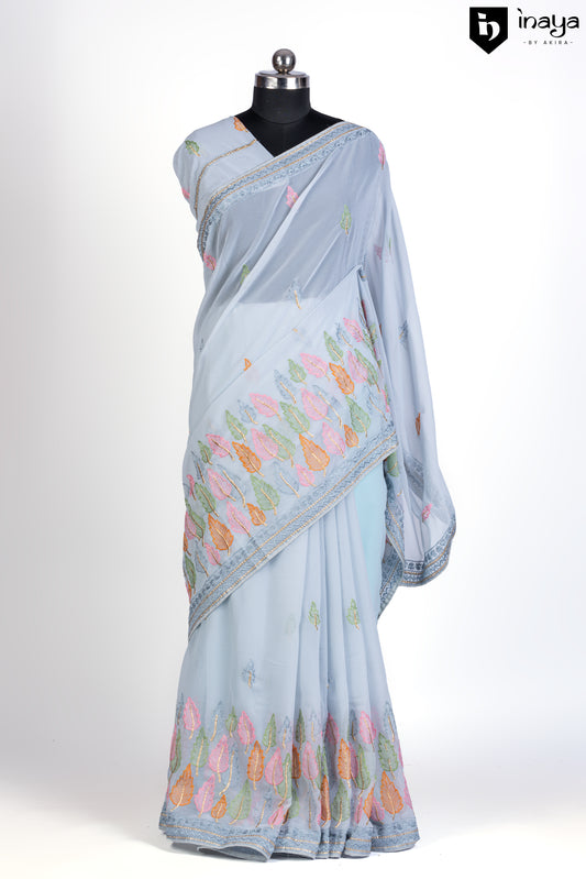 Serene Sky Blue Georgette Saree with Pastel Leaf Motifs