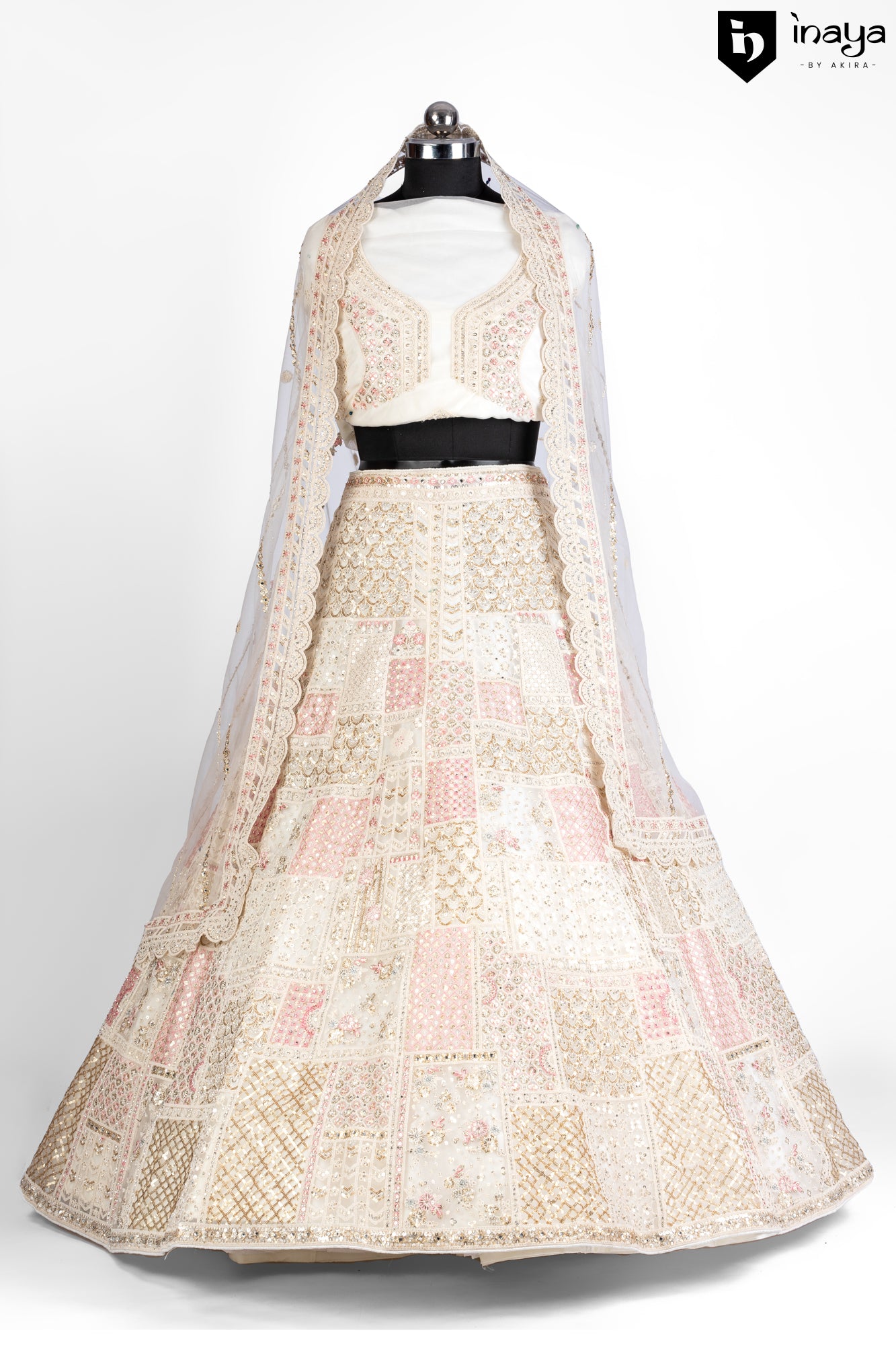 Vintage Cream Elegance: Cream Netted Fabric Semi-Stitched Lehenga with Delicate Embroidery